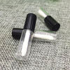 Picture of Mydio 50 Pack 1.2ML Clear Mini Lip Gloss Tube Empty Lip Balm Containers With Black Lid for Lipstick Samples