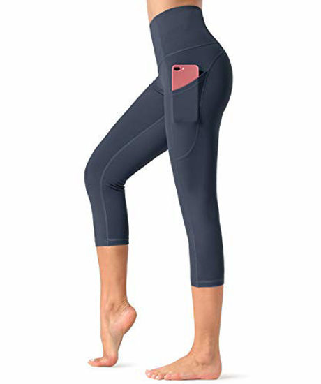 Picture of Dragon Fit High Waist Yoga Leggings with 3 Pockets,Tummy Control Workout Running 4 Way Stretch Yoga Pants (Medium, Capri29-Ink Blue)