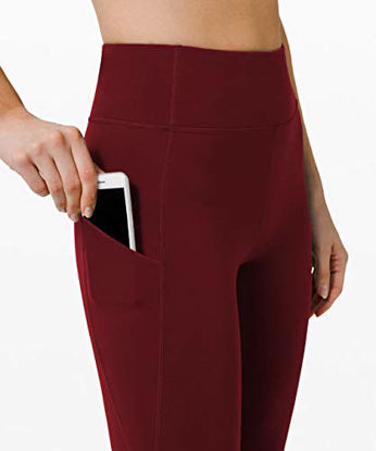 Picture of PHISOCKAT High Waist Yoga Pants with Pockets, Tummy Control Yoga Pants for Women, Workout 4 Way Stretch Yoga Leggings (Wine, Medium)