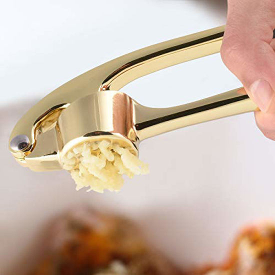 https://www.getuscart.com/images/thumbs/0614599_zulay-premium-garlic-press-soft-easy-squeeze-ergonomic-handle-sturdy-design-extracts-more-garlic-pas_550.jpeg