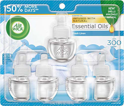 Picture of Air Wick Plug in Scented Oil 5 Refills, Fresh Linen, (5x0.67oz), Same Familiar Smell of Fresh Laundry, New look, Packaging May Vary, Essential Oils, Air Freshener