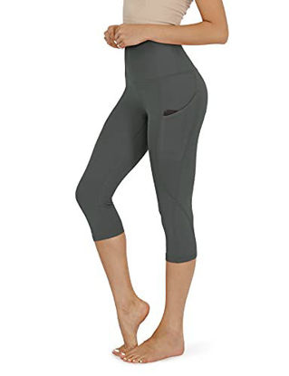 Picture of ODODOS Women's High Waist Yoga Capris with Pockets  Workout Sports Running Athletic Capris Leggings with Pocket