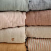 Picture of mushie Extra Soft Muslin Fitted Crib Sheet | 28"x 52" (Bloom)