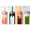 Picture of Kodrine 20oz Glass Water Bottle with Straw and Lid,Bamboo Lids Water Tumbler, Iced Coffee Cup Reusable, Wide Mouth Smoothies Cup, Straw Silicone Protective Sleeve BPA FREE-White+Black-2pack