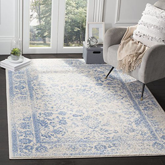 Picture of SAFAVIEH Adirondack Collection ADR109L Oriental Distressed Non-Shedding Living Room Bedroom Area Rug, 5'1" x 7'6", Ivory / Light Blue