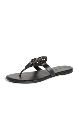 Tory burch black 2025 and white flip flops
