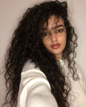 Picture of Long Curly Black Wigs for Women Black Wavy Wig Natural Looking Loose Wave Hair Glueless Heat Resistant Synthetic Wig Hair Replacement Wig