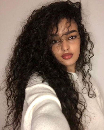 Picture of Long Curly Black Wigs for Women Black Wavy Wig Natural Looking Loose Wave Hair Glueless Heat Resistant Synthetic Wig Hair Replacement Wig