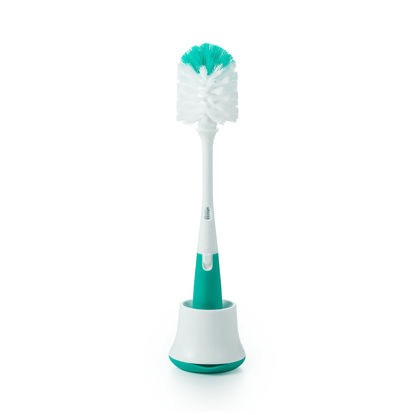 Picture of OXO Tot Bottle Brush with Nipple Cleaner and Stand - Teal, 1 Count (Pack of 1)