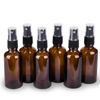 Picture of hmaimas 6 Pack Amber Glass Spray Bottles for Essential Oils, 2oz Small Fine Mist Travel Empty Spray Bottle for Hair and Plants