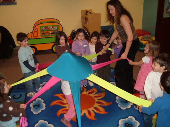 Picture of S&S Worldwide Octaband - Multi-Colored Therapy Movement Band - Dance/Movement Therapy - Group Tool (8-Arm)