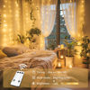 Picture of JMEXSUSS 300 LED Remote Control Christmas Curtain Lights, Plug in Fairy Curtain Lights Outdoor, Window Wall Hanging Curtain String Lights for Bedroom Backdrop Wedding Party Indoor Decor, Warm White