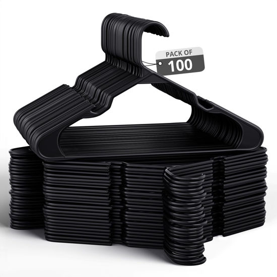 Picture of Our Modern Space 100 Pack Adult Plastic Hanger for Shirt Pants Coats Dresses Skirts Suits Jackets - Standard Thick Coat Hanger - Sturdy & Durable Design with Shoulder Grooves Hook - Black
