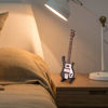 Picture of Miniature Bass, Black Miniature Bass Miniature Guitar Guitar Replica with Stand and Case Instrument Model Ornaments Gift be placed on the bookcase, desk, beside table and music room as decoration