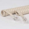 Picture of Cablesys Coiled Telephone Handset Cord for Use with PBX Phone Systems, VoIP Telephones - 6 Ft Uncoiled, Rj22, 1.5 Inch Lead on Both Ends, Ivory