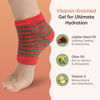 Picture of ZenToes Moisturizing Sleep Socks with Vitamin E, Olive Oil and Jojoba Seed Oil to Soften and Hydrate Dry Cracked Heels (Holiday Stripes, Regular)