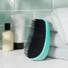 Picture of Amazon Basics Detangling Palm Brush For Adults and Kids, For All Hair Types Wet or Dry, Turquoise