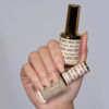 Picture of DND Gel DC Sheer Polish Set - 1 each of Gel Polish and Nail Polish, Tan Lines, 0.5 Fl Oz