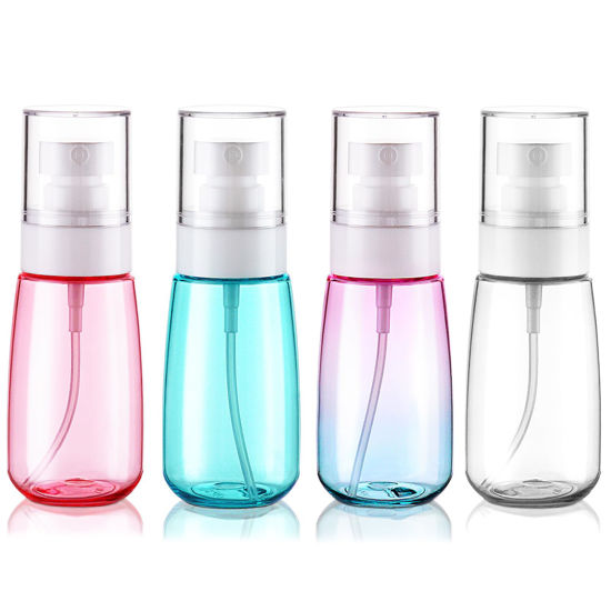 Picture of Cosywell Fine Mist Spray Bottles TSA Approved 2oz 60ml 4 Pack Leak Proof Fine Mist Spray Bottles Empty Plastic Refillable Mist Sprayer for Perfume Essential Oils Toners Rose Water Cosmetics(4Colors)
