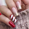 Picture of Christmas Press on Nails Medium Snowflake Fake Nails Red and White Stripes Design Winter Xmas False Nails with Glue on Nails Reusable Artificial Nails Stick on Nails for Women DIY Manicure Decoration