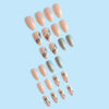 Picture of Christmas Press on Nails Medium Almond Winter Fake Nails Nude Full Cover White Snow False Nails with Designs Sliver Glitter Glossy Glue on Nails Acrylic Manicure Artificial Nails for Women Girls 24Pcs