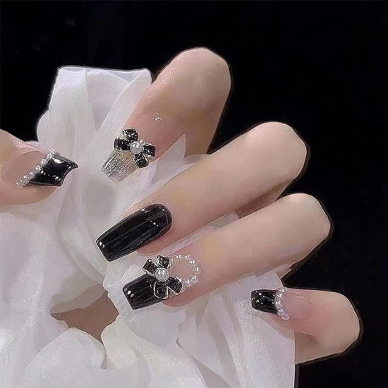 Picture of 24Pcs Press on Nails Medium Length Fake Nails with Black Bow Pearl Designs,Artificial Acrylic Full Cover Reusable Coffin False Nails, Women Glue on Nails Set,Stick on Nails for Nail Art
