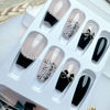 Picture of 24Pcs Press on Nails Medium Length Fake Nails with Black Bow Pearl Designs,Artificial Acrylic Full Cover Reusable Coffin False Nails, Women Glue on Nails Set,Stick on Nails for Nail Art