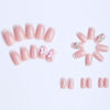 Picture of French Tip Press on Nails White Fake Nails Nude False Nails with Bow Charms Nail Gems Star Designs Glossy Pearl Rhinestones Glue on Nails Medium Length Nails Press on Acrylic Nails for Women 24Pcs