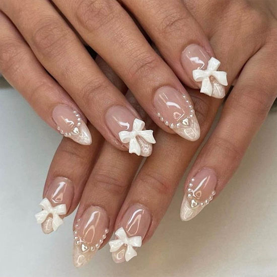 Picture of White French Tip Press on Nails Pointed Almond Shape French Pearl White Bow Fake Nails Design Tips Nail Nude Color Cute Bow Stick on Nails for Women Girls Manicure Daily Wear 24Pcs