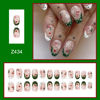 Picture of Christmas Press on Nails Medium Oval Fake Nails French Tip False Nails With Snowflake Candy Xmas Tree Santa Hat Designs Full Cover Stick on Nails Acrylic Winter Artificial Nails for Women Girls 24Pcs