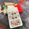 Picture of Christmas Press on Nails Medium Oval Fake Nails French Tip False Nails With Snowflake Candy Xmas Tree Santa Hat Designs Full Cover Stick on Nails Acrylic Winter Artificial Nails for Women Girls 24Pcs