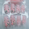 Picture of French Tip Press on Nails Medium Length Fake Nails 3D Bow Flower Design Nude Color French Nail Tips Charms Nails Rhinestones Nails for Women Daily Wear Cute False Nails 24Pcs