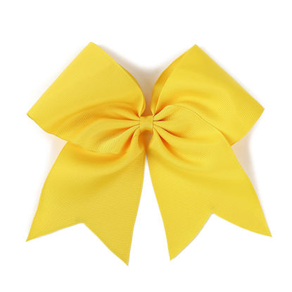 Picture of AMYDECOR 7 Inch Jumbo Solid Color Bows with Alligator Hair Clips For Girls and Women (Yellow)