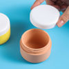 Picture of Kuangre Travel Containers for Toiletries, Silicone Cream Jars BPA Free, TSA Approved 2oz Travel Size Containers, Leak-proof Travel Essentials with Lid for Cosmetic Face Hand Body Cream (4 Pack)