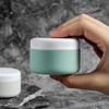 Picture of Kuangre Travel Containers for Toiletries, Silicone Cream Jars BPA Free, TSA Approved 2oz Travel Size Containers, Leak-proof Travel Essentials with Lid for Cosmetic Face Hand Body Cream (4 Pack)