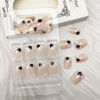 Picture of Valentine's Day Press on Nails Short Square Fake Nails with Black Heart Designs Acrylic Nails Press ons Glossy Glue on Nails Nude False Nails Artificial Stick on Nails for Women 24Pcs