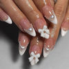 Picture of LPOODDNU Almond Press on Nails White French Tip Fake Nails Medium Length Acrylic Nails Press ons with Bow Charms Designs Cute White Pearls Glue on False Nails Reusable Stick on Nails 24pcs