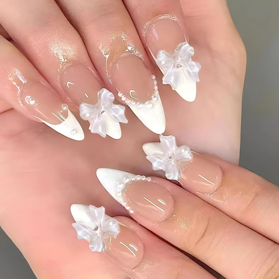 Picture of LPOODDNU White French Tip Press on Nails Almond Medium Fake Nails with Charms 3D Bow Pearl Acrylic False Nails Cute Artificial Nails Press ons Reusable Glue on Nails for Women and Girls 24Pcs