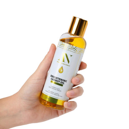 Picture of Organic Carrot Oil with Papaya Extract - Toning & Brightening Oil - Infused with Vitamin C, Non- Greasy Fast Absorbing Formula, Nourishing, Moisturizing, Hydrating, Face and Body Skincare Oil, 100% Pure Natural Organic Body Oil (6.7 oz / 200ml)