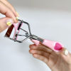 Picture of MERVK Stainless Steel Eyelash Curler with Built-in Comb Pinch Pain-Free Suitable for Any Eye Shapes and Sizes, with 5 Silicone Refill Pads (Peach Pink)