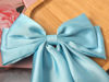 Picture of Furling Pompoms Oversized Hair Bows for Women,Large Satin Silky Hair Bow Clips Ribbon Long Tail French Barrette Hair Clamps Ponytail Hair Accessories Party Wedding (Sky Blue)