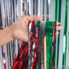 Picture of Red Silver Green Party Streamers - GREATRIL Christmas Tinsel Backdrop for Xmas Winter Italian Elf Themed Parties Decorations - 2 Packs