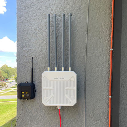 Picture of WAVLINK 2025 AX1800 WiFi 6 Wireless Outdoor Extender, Long Range Outdoor WiFi with Dual Band with POE, Supports Mesh Extender/AP/Repeater/IP67 Waterproof for Farm,Courtyard,RV,Campsite
