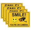 Picture of 4 Smile You're on Camera Stickers for Home, 10 X 7 Inch Self-Adhesive Vinyl Decal, Video Surveillance Signs Outdoor, Security Camera Signs for Business, Driveway Alert, and CCTV.