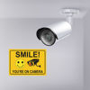 Picture of 4 Smile You're on Camera Stickers for Home, 10 X 7 Inch Self-Adhesive Vinyl Decal, Video Surveillance Signs Outdoor, Security Camera Signs for Business, Driveway Alert, and CCTV.