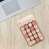 Picture of Lomiluskr Wireless Numeric Keypad with 2.4G USB Receiver, Cute Colorful Round Keycaps, Portable Financial Accounting Numpad Number Keyboard, Suitable for PC, Laptop (Milk Tea)