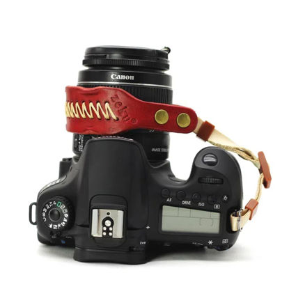 Picture of Bebaimis Camera Wrist Strap, Vintage Leather Camera Hand Strap for DSLR SLR Mirrorless, Adjustable Safety Strap,Camera Strap Leather Hand Wrist Grip for SLR DSLR Photography Accessory,Red