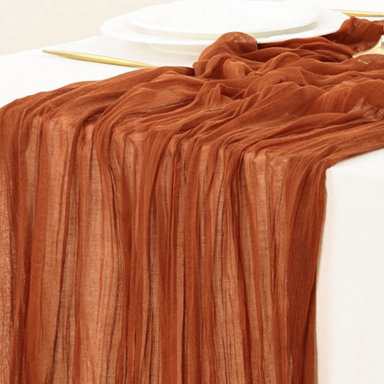 Picture of Socomi Fall Thanksgiving Table Runner Cheesecloth Table Runner Terracotta 120 inch 10FT Boho Rustic Gauze Table Runner for Wedding Party Baby Shower Fall Decor 10pcs