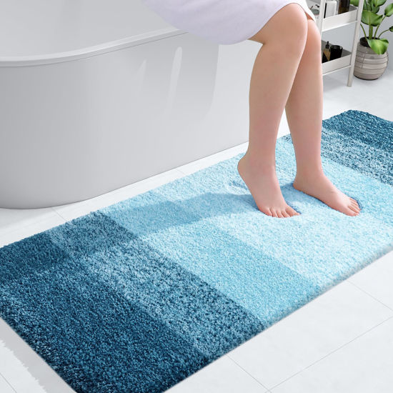 Picture of OLANLY Bathroom Runner Rugs 54x24, Extra Soft Absorbent Microfiber Bath Rugs, Rubber Backing, Quick Dry, Washable Bath Mats for Bathroom Floor, Tub, Shower and Home Decor Accessories, Peacock Blue