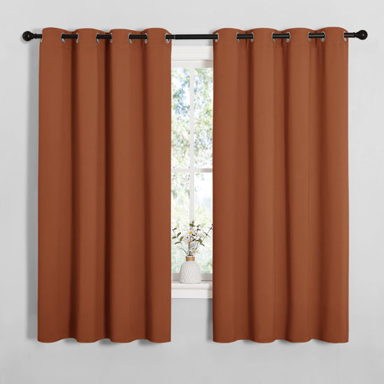 Picture of NICETOWN Halloween Blackout Curtain Panels for Girls Room, Nursery Essential Thermal Insulated Solid Grommet Top Blackout Drapes (Burnt Orange, 1 Pair, 55 x 68 inches)